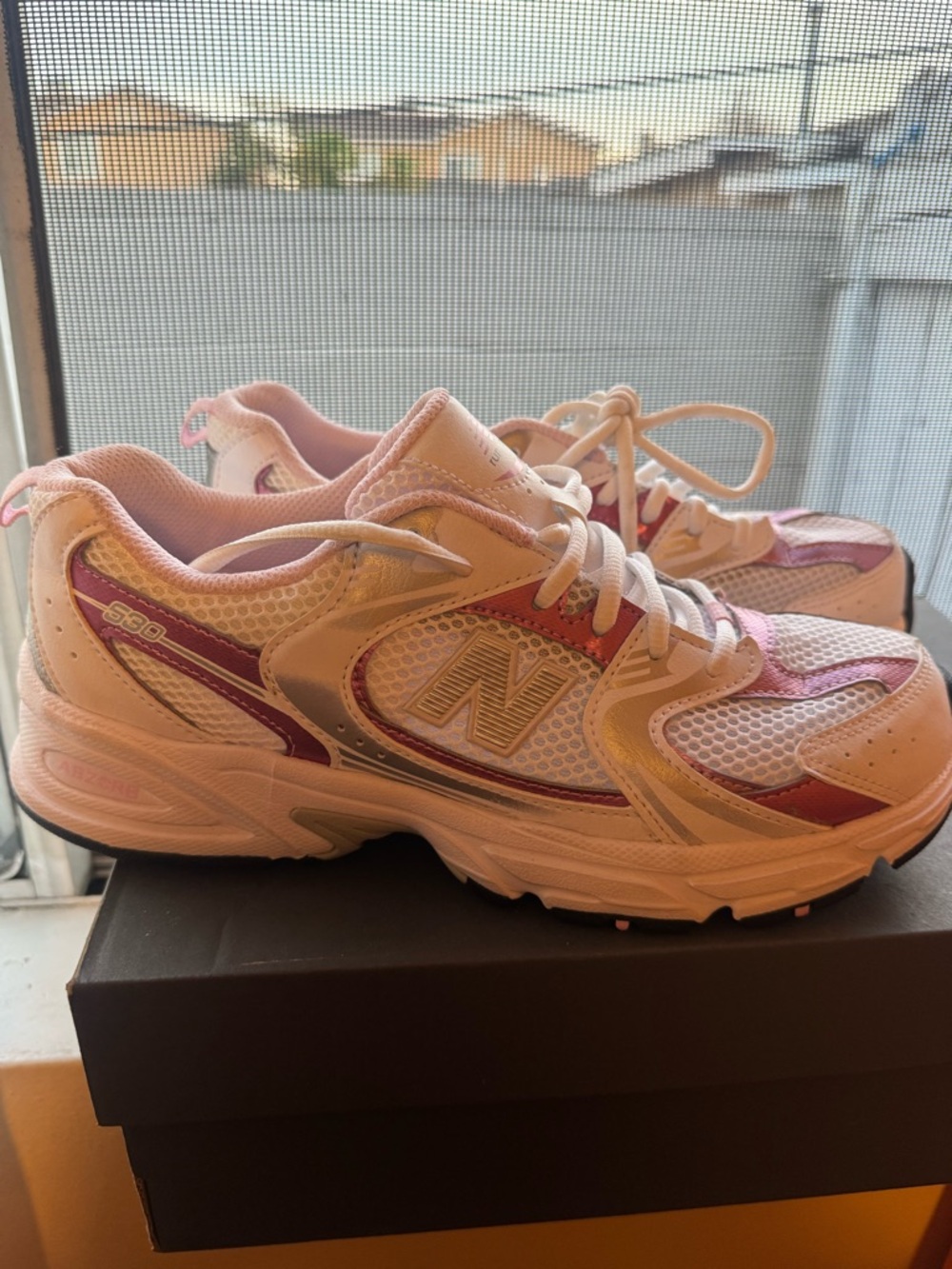 New Balance Women's Athletic Sneakers in Pink and White